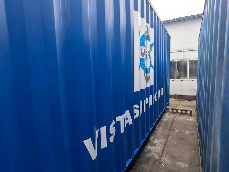 Close-up of the Vista Shipping Line logo on a blue container