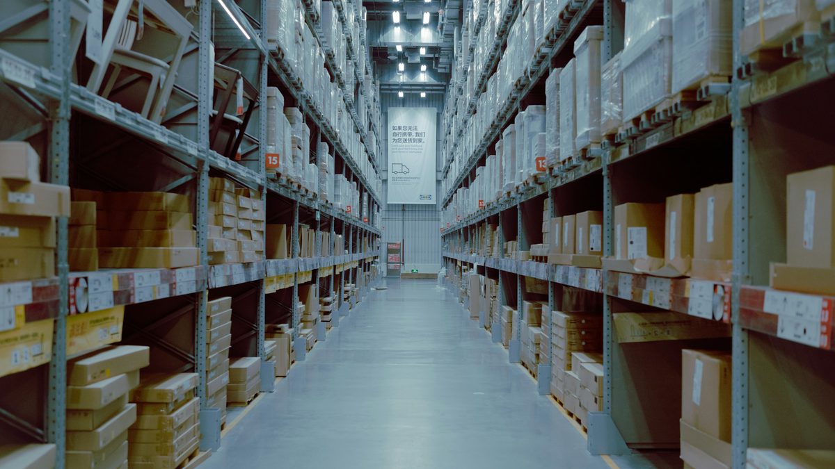 Warehouse aisle with racked cargo