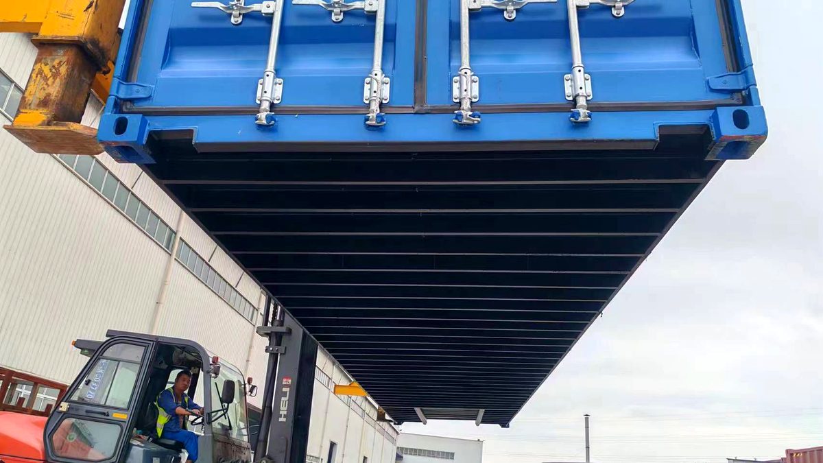 Container being lifted during cargo operations