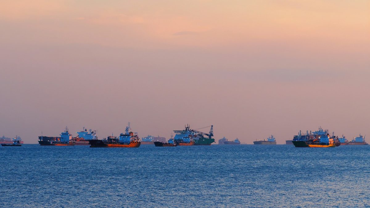 Vessels waiting at anchorage at dusk